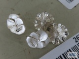2 pairs of silver colored floral earrings, marked 925.