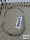 Silver colored wide herringbone chain, marked 925 Italy.