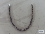 Silver colored bracelet, marked 925 Italy. Clasp needs repaired.