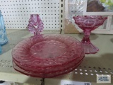 Pink glass plates, candy dish, and candlestick