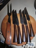 E. Parker and Sons Sheffield England steak knives, The Master Carver fork, and apple cutting board