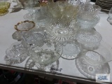 Large variety of clear glass bowls and mugs
