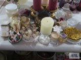 Variety of candles and candle holders