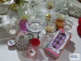 Large assortment of candles and candle holders