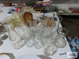 Variety of glass jars and Playboy advertising glass