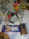 Variety of kitchen items including knife sharpener, thermometer, salt and pepper grinders, cookie