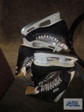 Two pairs of Bauer ice skates. No sizes