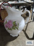 Large floral wash bowl made by Vienna number 178, has chip on top