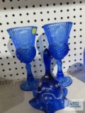 Pair of blue glass stemware and hand painted bell