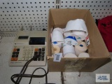 Texas Instruments electronic calculator with extra rolls