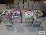 Four stacks of football cards