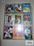 Baseball cards and Lion King cards, including Michael Jordan baseball cards in plastic sleeves