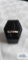 Two toned band with one single clear gemstone, marked 10K, 1.23 G, size 7