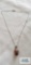 Silver colored pendant with Moonstone, on silver colored chain, both marked 925, 5.4 G