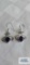 Silver colored bangle earrings with purple stone, marked 925, approximately 4.0 G