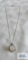 Silver colored pendant with cloudy stone (moon stone) on silver colored chain, both marked 925, 8.5