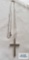 Silver cross pendant, marked INOX 925, on silver colored 20