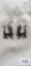 Silver colored cat dangle earrings, marked 925