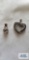 Silver colored heart pendant with clear and black stones and silver color pendant with clear stone,