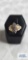 Gold colored ring with clear stones marked 10K. (Seller description is total weight diamond) 4.0G,