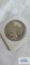 1925, uncirculated peace dollar coin.