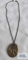 Antique gold colored floral and cross locket marked SBL Co Fribes (seller description gold filled)
