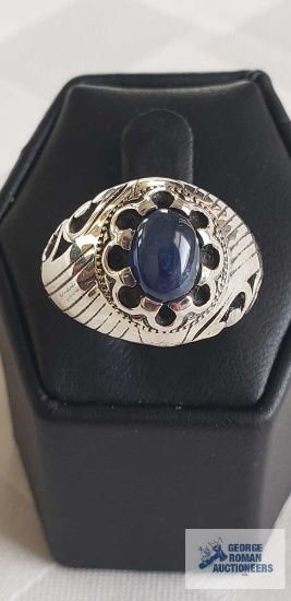 Silver colored ring with dark blue stone, marked Orchid 925, 5.1 G, size 7.5