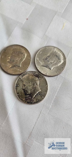 (3) 1964 Kennedy half dollars.