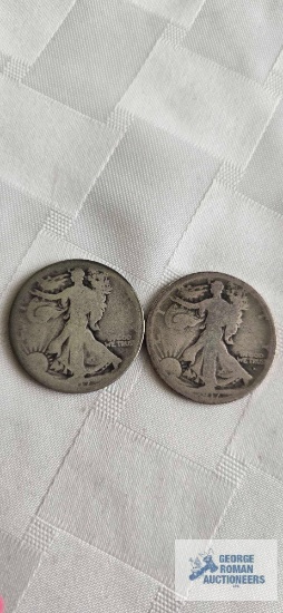 2 Walking Liberty half dollar coins, both may be marked 1917 (see pictures)