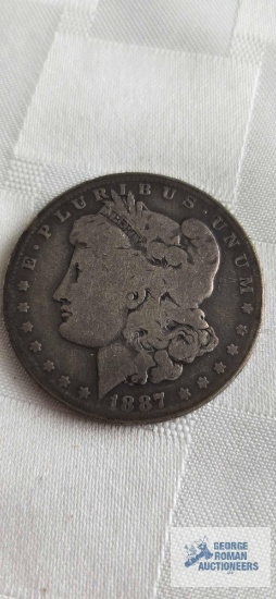 1887 Morgan one dollar coin, marked O