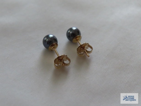 Black stone earrings, marked Krementz