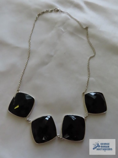 Silver colored black stone necklace. Piece has been added on which is marked 925.