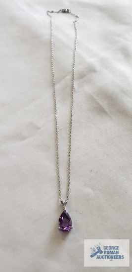 Silver colored pendant with purple stone, marked 925 on the silver colored chain, marked 925, 2.9 G.