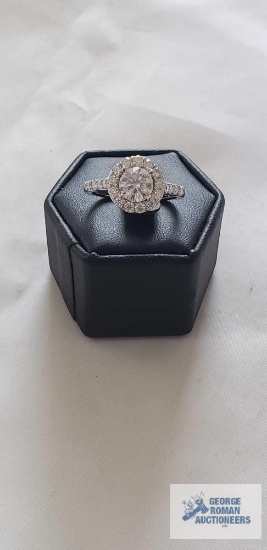 Silver colored engagement style ring with clear gemstones (CZ), marked 925, size 7, 3.6 G