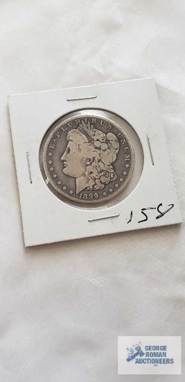 1899 Morgan one dollar coin, marked O