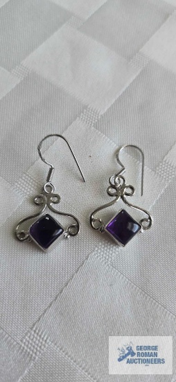 Silver colored bangle earrings with purple stone, marked 925, approximately 4.0 G