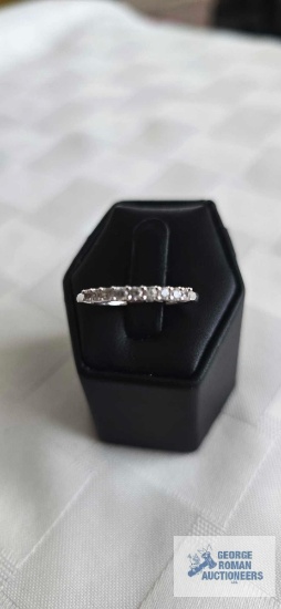 Silver colored band ring with clear gemstones, marked 925, 2.1 G, size 8