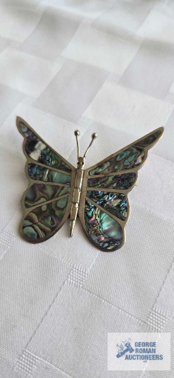 Iridescent shell butterfly pin marked HECHO EN TFX CO, approximately 4.3 G.