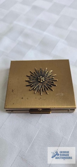 Compact coin holder