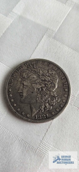 1881 Morgan one dollar coin, marked O