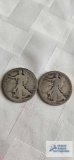 2 Walking Liberty half dollar coins, both may be marked 1917 (see pictures)