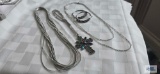 Costume jewelry necklaces and earrings.
