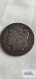 1887 Morgan one dollar coin, marked O