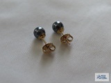 Black stone earrings, marked Krementz