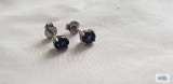 Silver colored earrings with purple stone, marked 925