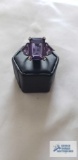 Silver colored ring with three large purple stones, marked 925, 5.2 G, size 7