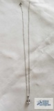 Silver colored pendant with clear stone, no marking, on silver color chain, marked 925
