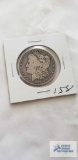 1899 Morgan one dollar coin, marked O