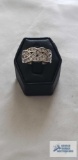 Silver colored band ring with clear stones, marked 925 CZ, 6.2 G, size 8