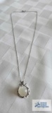 Silver colored pendant with cloudy stone (moon stone) on silver colored chain, both marked 925, 8.5